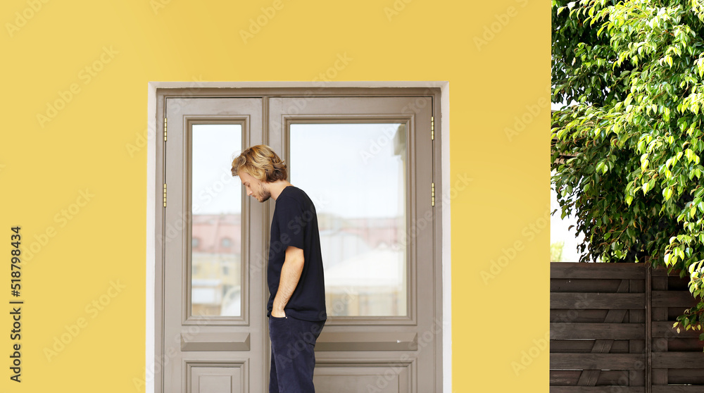 Man opening the door of her home.Inviting the guests Man opening the door of her home.Inviting the guests