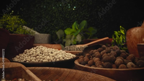 Cooking seasonings and condiments concept. Assortment of whole spices in wooden bowls