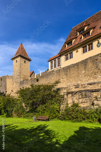 Rothenburg ob der Tauber, Germany. Bench in the park under the medieval fortress wall