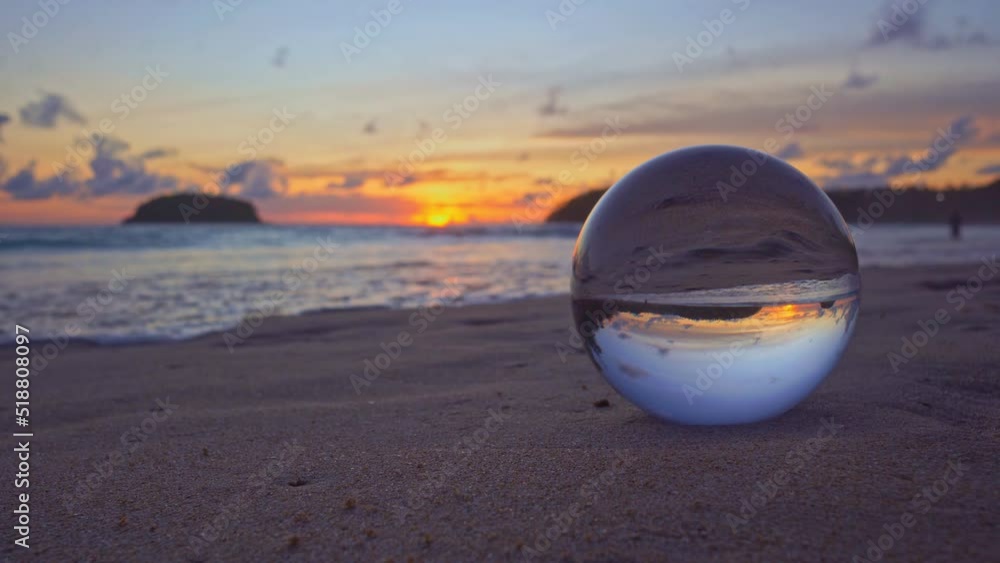 .view of beach sky at sunset inside crystal ball on a glass..sunset over sea in a crystal ball place on the beach video 4K. .Nature video High quality footage in nature and travel concept. .view of beach sky at sunset inside crystal ball on a glass..sunset over sea in a crystal ball place on the beach video 4K. .Nature video High quality footage in nature and travel concept.
