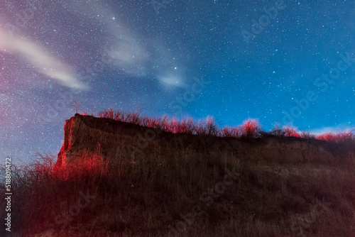 View of the sea on a moonlit night made with long exposure. Night sky. Stars. Ochakov. Ukraine photo