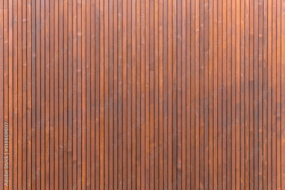 Holzwand aus Leisten als Hintergrund mit Textfreiraum Holzwand aus Leisten als Hintergrund mit Textfreiraum