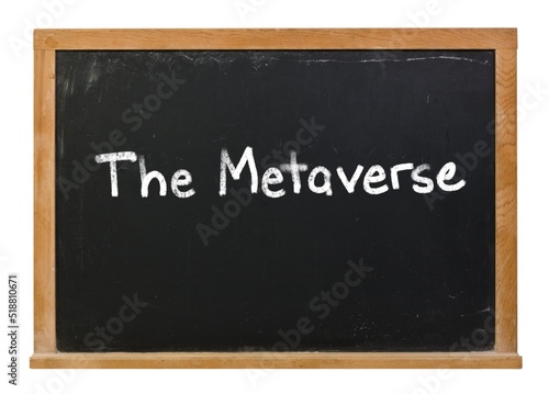 The Metaverse written in white chalk on a black chalkboard isolated on white