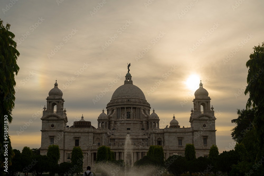 Beautiful Victoria Memorial architectural monument and museum at sunset. Kolkata, India. historic monument and museum with moody sunrise sky.