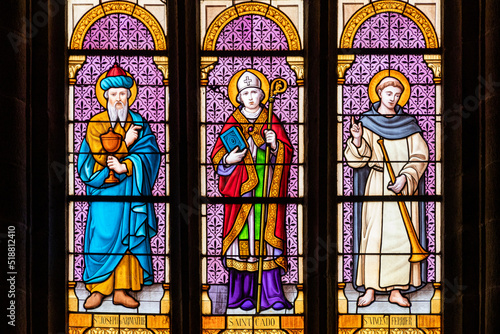 Ploumilliau (Plouilio), France. Stained glass window in the St Miliau Church depicting Saint Joseph of Arimathea, Saint Cadoc and Vincent Ferrer