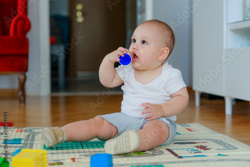 Baby boy playing with toy