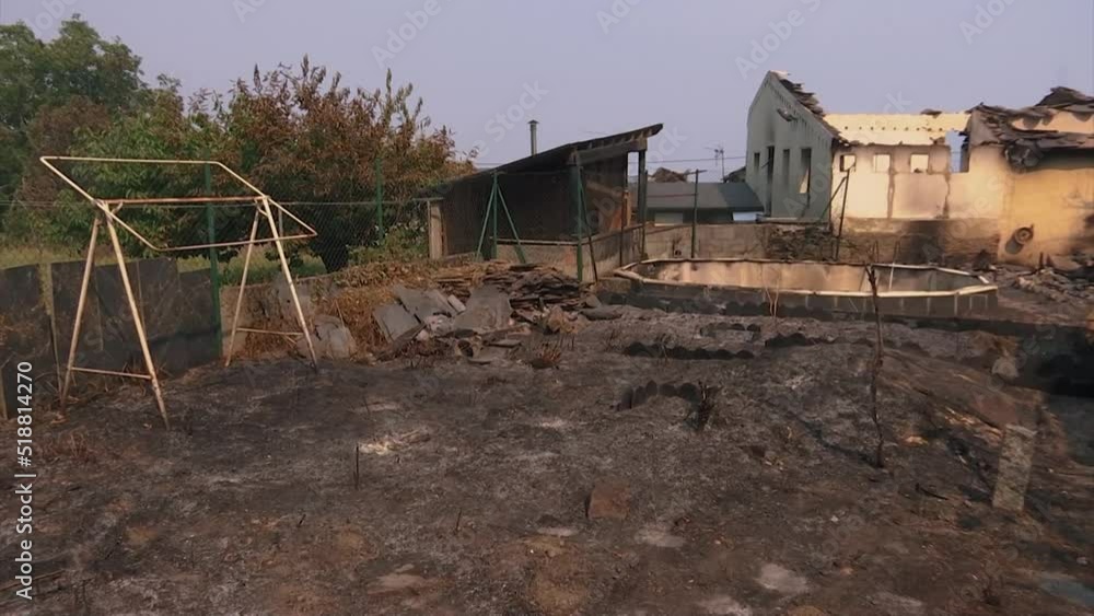 OUTDOOR PATIO WITH SWING AND SWIMMING POOL BURNED AFTER A FOREST FIRE OUTDOOR PATIO WITH SWING AND SWIMMING POOL BURNED AFTER A FOREST FIRE