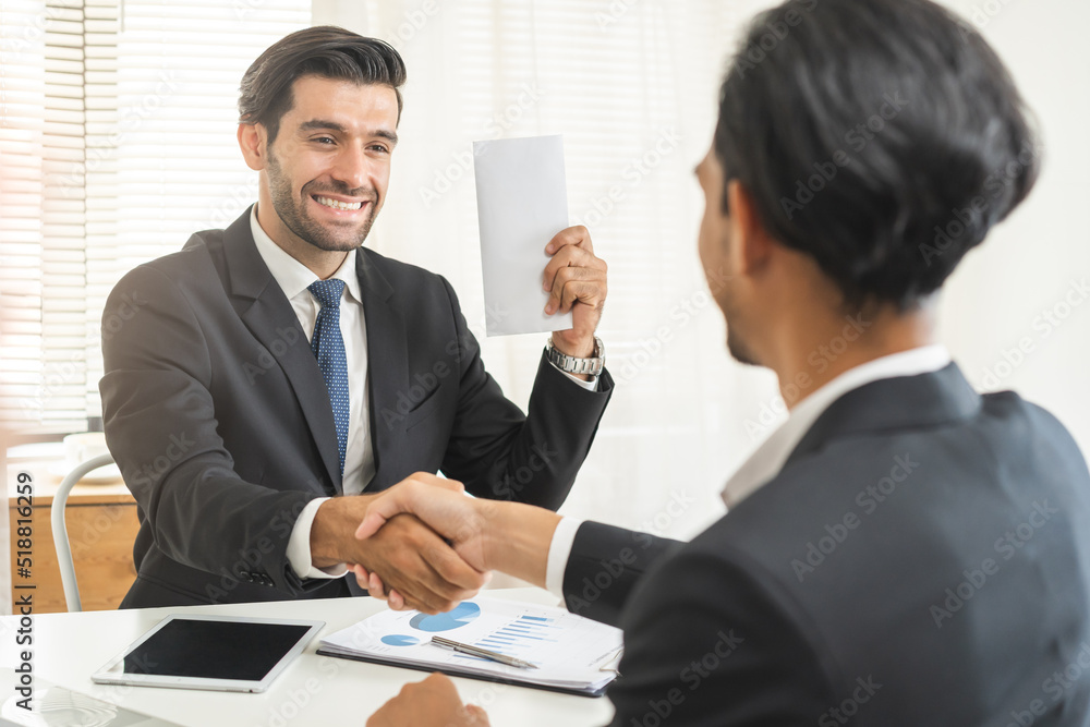 Handshake, caucasian male giving financial reward in an envelope, business letter extra salary to company employee, asian manager man worker office hand received premium bonus,getting cheque from boss Handshake, caucasian male giving financial reward in an envelope, business letter extra salary to company employee, asian manager man worker office hand received premium bonus,getting cheque from boss