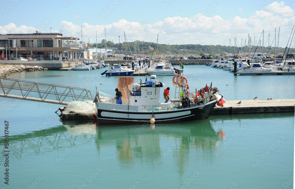 Inshore fishing boat in the fishing port of Rota, Cadiz coast, Andalusia Spain