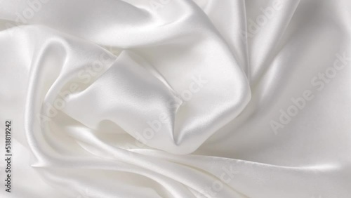 White cloth satin. Abstract background luxury cloth or liquid wave. Silk texture material. Abstract white elegant wallpaper design