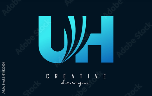 Creative blue letters UH u h logo with leading lines and road concept design. Letters with geometric design. photo