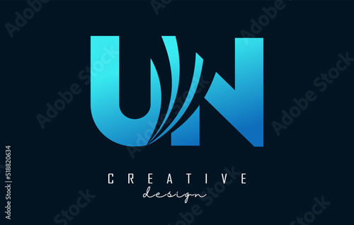 Creative blue letters UN u n logo with leading lines and road concept design. Letters with geometric design.
