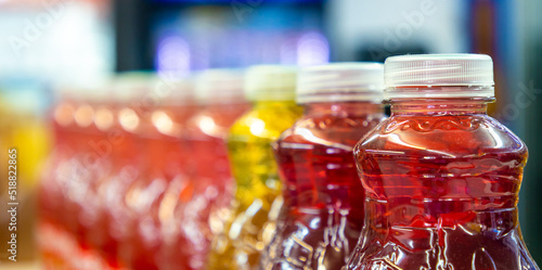 Φωτογραφία Juice bottles on convenience store shelf