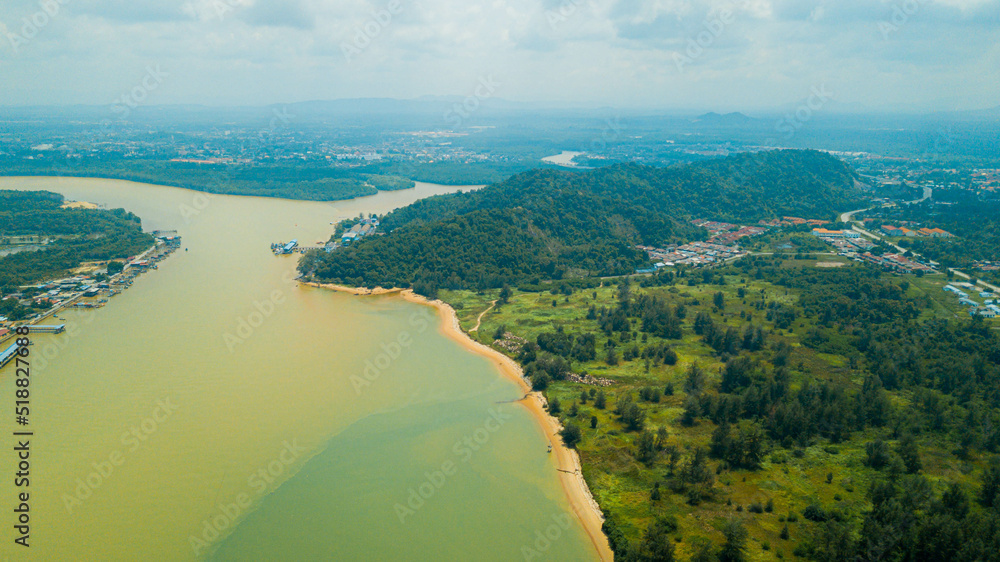 Aerial drone view of shoreline scenery in Pantai Marina Telaga Simpul, Kemaman, Terengganu, Malaysia.