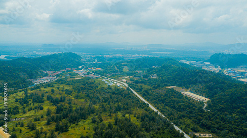 Aerial drone view of rural area and a road in Pantai Marina Telaga Simpul, Kemaman, Terengganu, Malaysia.