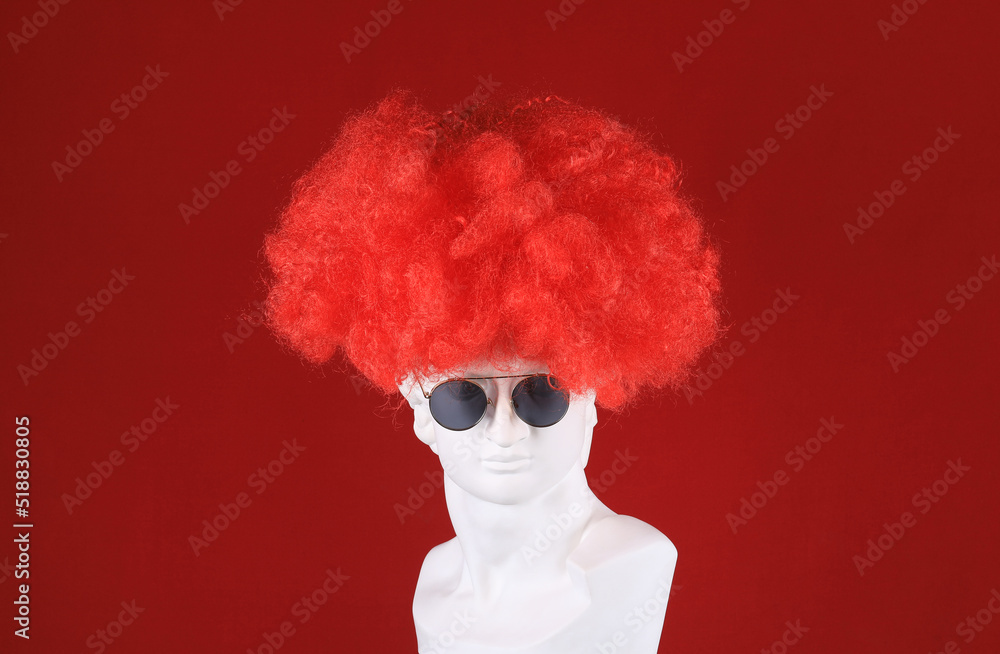 wig on a white plaster head sculpture wig on a white plaster head sculpture