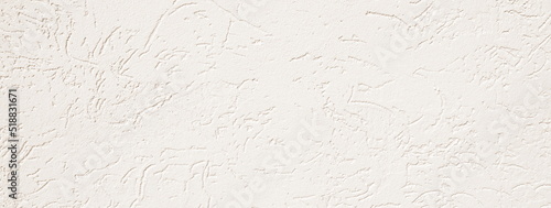 Decorative Plaster Bark Beetle Texture. Light Wall with Plaster. Stucco or Daub. Wide Background photo