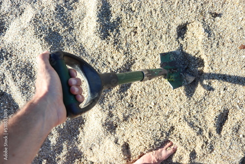 Photos detection shovel at the beach