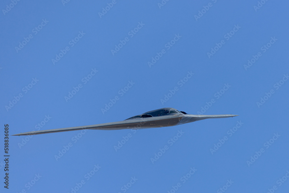 Unusual frontal view of a B2 Spirit stealth bomber in beautiful light