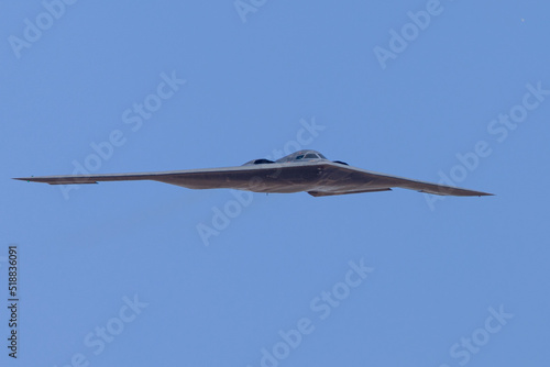 Fotografi Unusual frontal view of a B-2 Spirit  stealth bomber in beautiful light