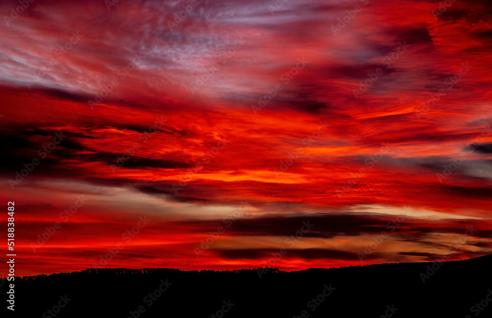 Beautiful sunset background with cloudy sky.