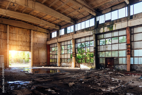 Old broken empty abandoned industrial building waiting for demolition or reconstruction