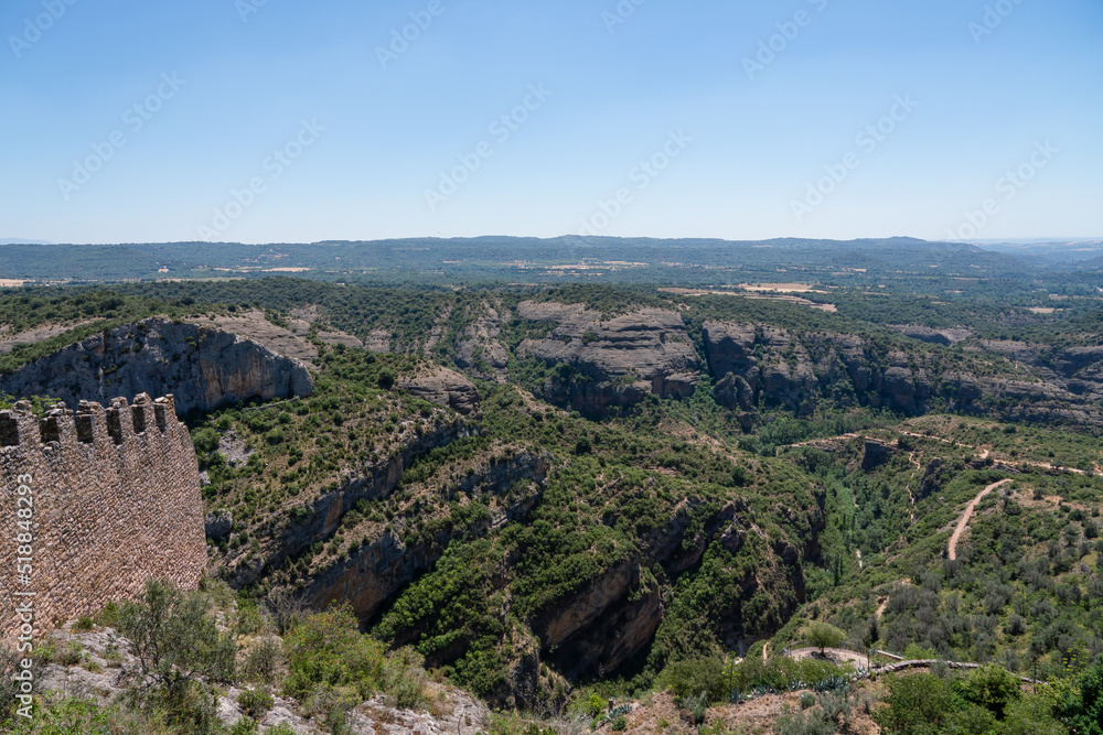 view out from a limestone outcrop village over the canyon and gorges of the a National Park 