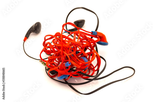 Принти на полотні tangled various headphones on white