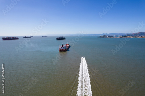 San Francisco Bay Shipping Lanes with speed boat and wake in foreground