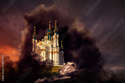 St. Michael's Golden-Domed Monastery in Kiev shrouded in smoke - symbol of the war in Ukraine.