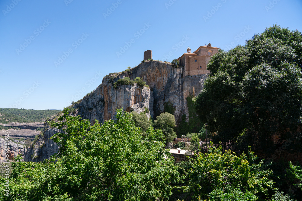 former fortress village with an active church built atop a limestone outcrop 