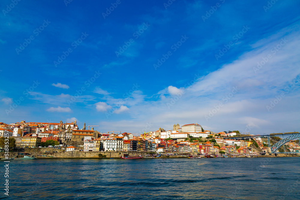 Porto, Portugal, Riberia old town cityscape with colorful houses, Dom Luis bridge, seen form Douro River