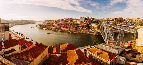 Porto, Portugal, Panoramic cityscape view of Riberia district with colorful houses and Ponte de Dom Luis bridge over Douro river. photo