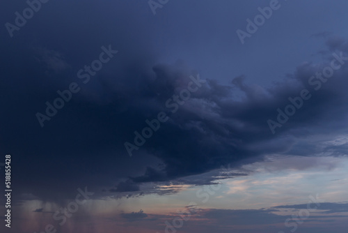 Storm sky with dark rain grey blue epic clouds background texture, hurricane with thunderstorm, cyclone 