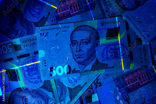 Fotografi Ukrainian currency hryvnia in ultraviolet rays