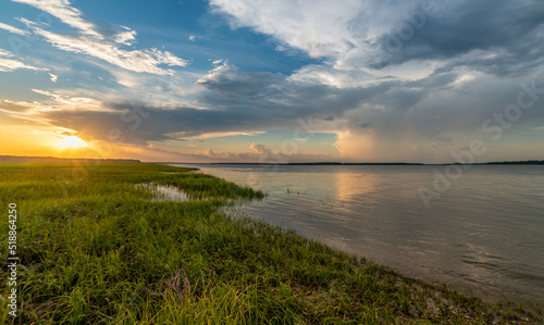 Coastal sunset by the marsh