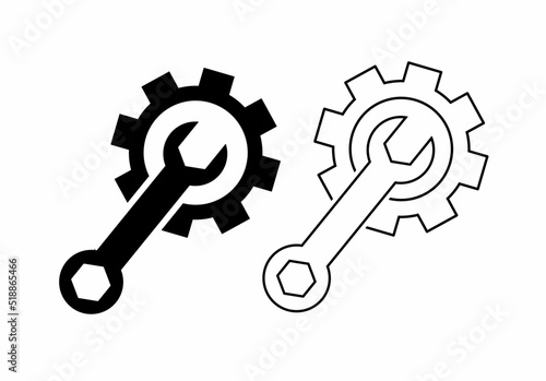 maintenance icon with spaner and wheel isolated on white background photo