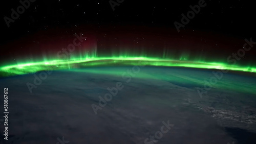 Northern lights view from space. Animation. Northern lights from the stratosphere. Northern Lights over lagoon in Iceland. Beautiful natural phenomenon Animation