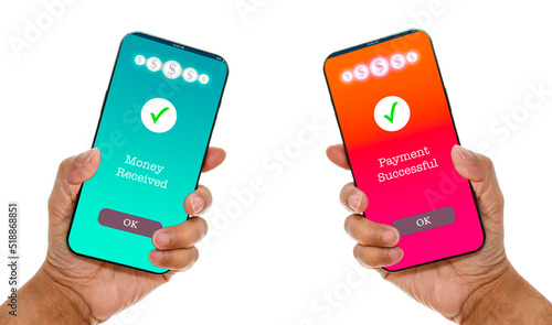 A man's hand holds a smartphone on screen with the messages payment successful and Money received. Concept of financial transactions with mobile devices. Closeup, transfer, Payment. White background