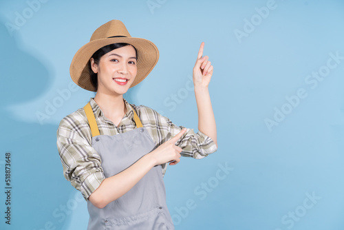 Portrait of young Asian female farmer