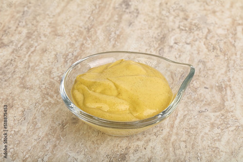 Organic mustard sauce in the bowl
