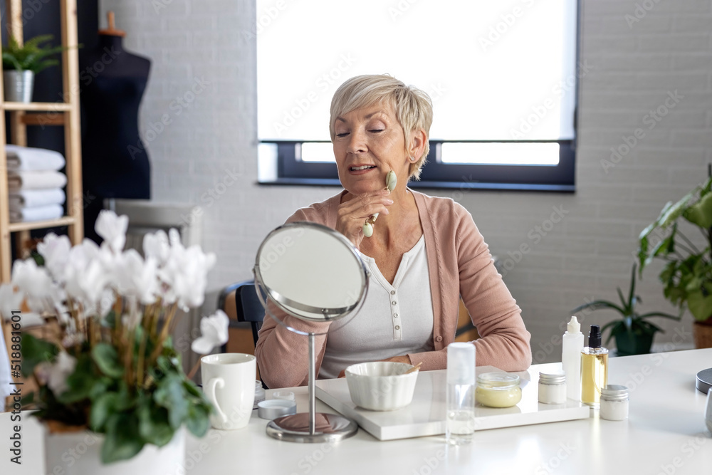 Mature woman taking face treatmant at her home Mature woman taking face treatmant at her home