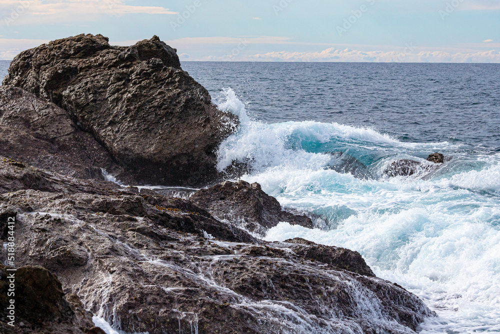 Fototapeta premium Waves on the rocks, Bermagui, NSW, June 2022