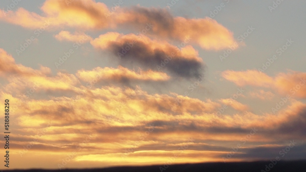 sunset or sunrise landscape Amazing light of nature cloudscape sky and Clouds moving away rolling colorful dark sunset clouds. Nature environment background