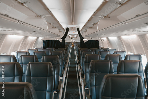 Wallpaper Mural Commercial aircraft cabin with rows of seats down the aisle Torontodigital.ca