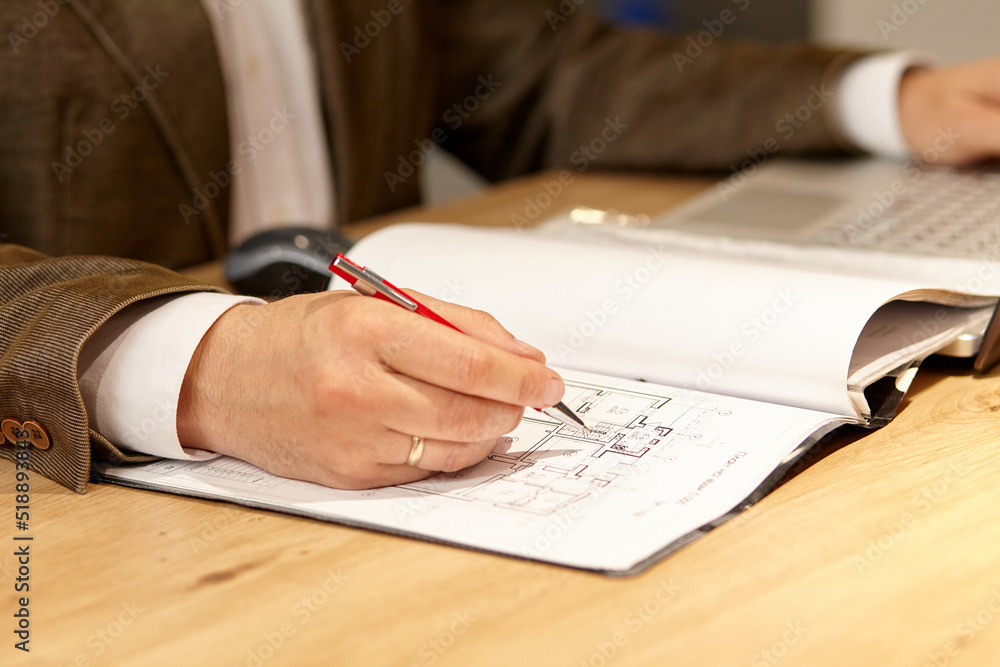 architect checking documents architect checking documents