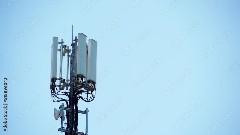 Signal or mobile phone tower against blue sky. Radio antenna. Modern telecommunication by using 5g or 4g internet. Signal or mobile phone tower against blue sky. Radio antenna. Modern telecommunication by using 5g or 4g internet.