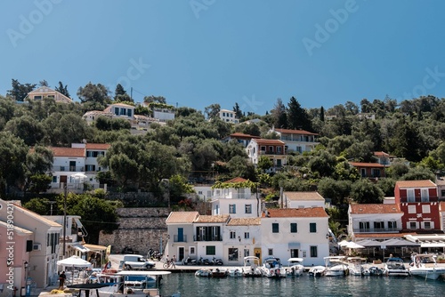 Loggos harbour with cute houses on Paxos, Greece