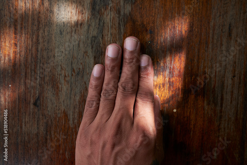 hands on wooden background
