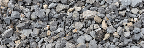 Panoramic image. Gray gravel stones. Gravel stones background
